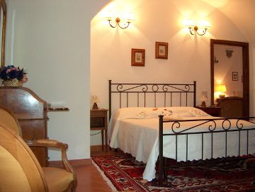 Villa Sant'Agnese, a bedroom of the suite